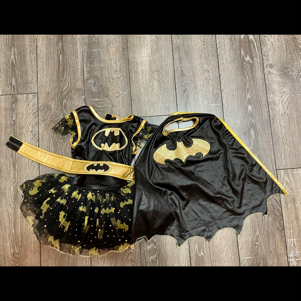 Batgirl superhero costume with tutu, utility belt and cape